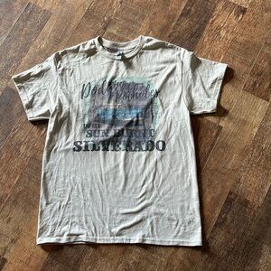 Gildan screen print “dodgin potholes in my sun burned silverado” medium